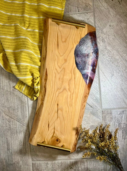 Charcuterie board with resin accent and gold handles